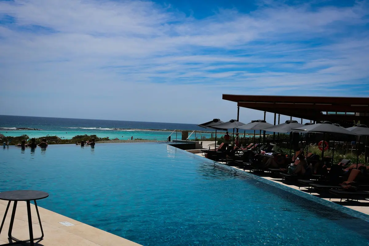 Saltwater infinity pool on the cliff edge, facing the open sea